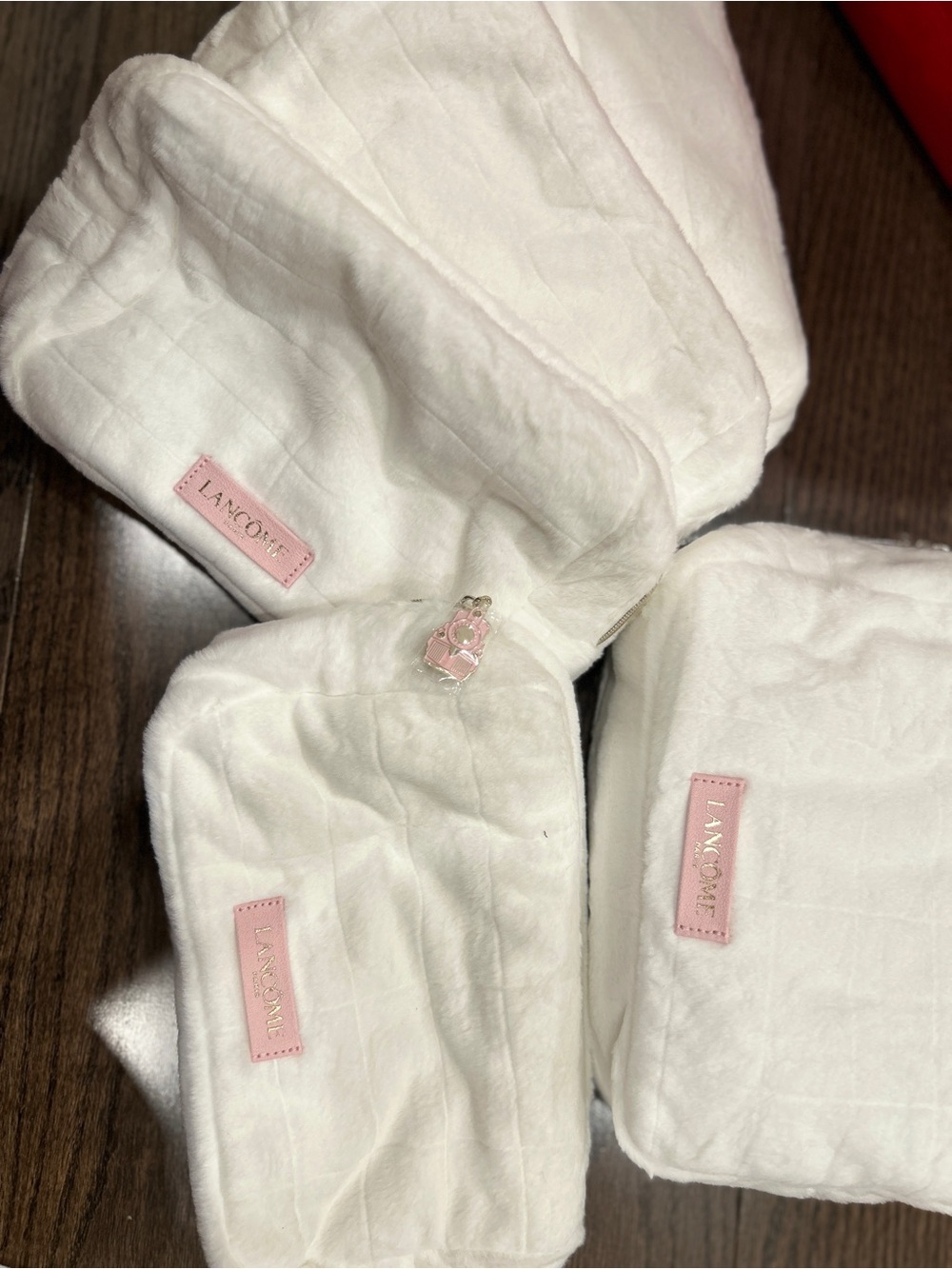 5 Lancôme White Quilted Cosmetic Pouches with Pink Logo Tags